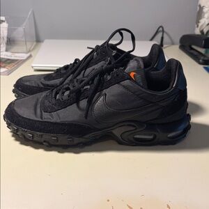 Nike Men's Black Sneakers with Orange Accent